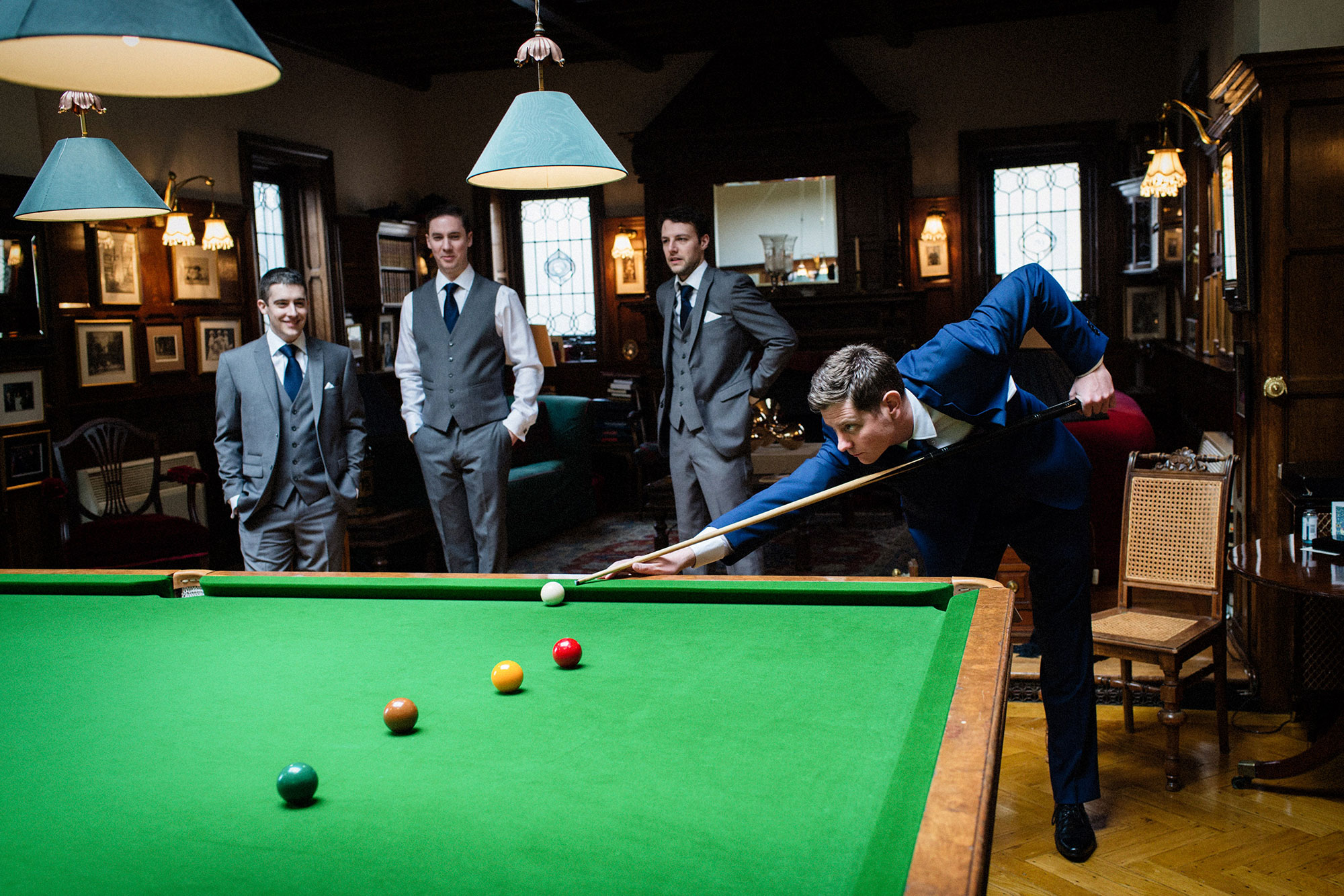Groom playing pool Dundas Castle Edinburgh