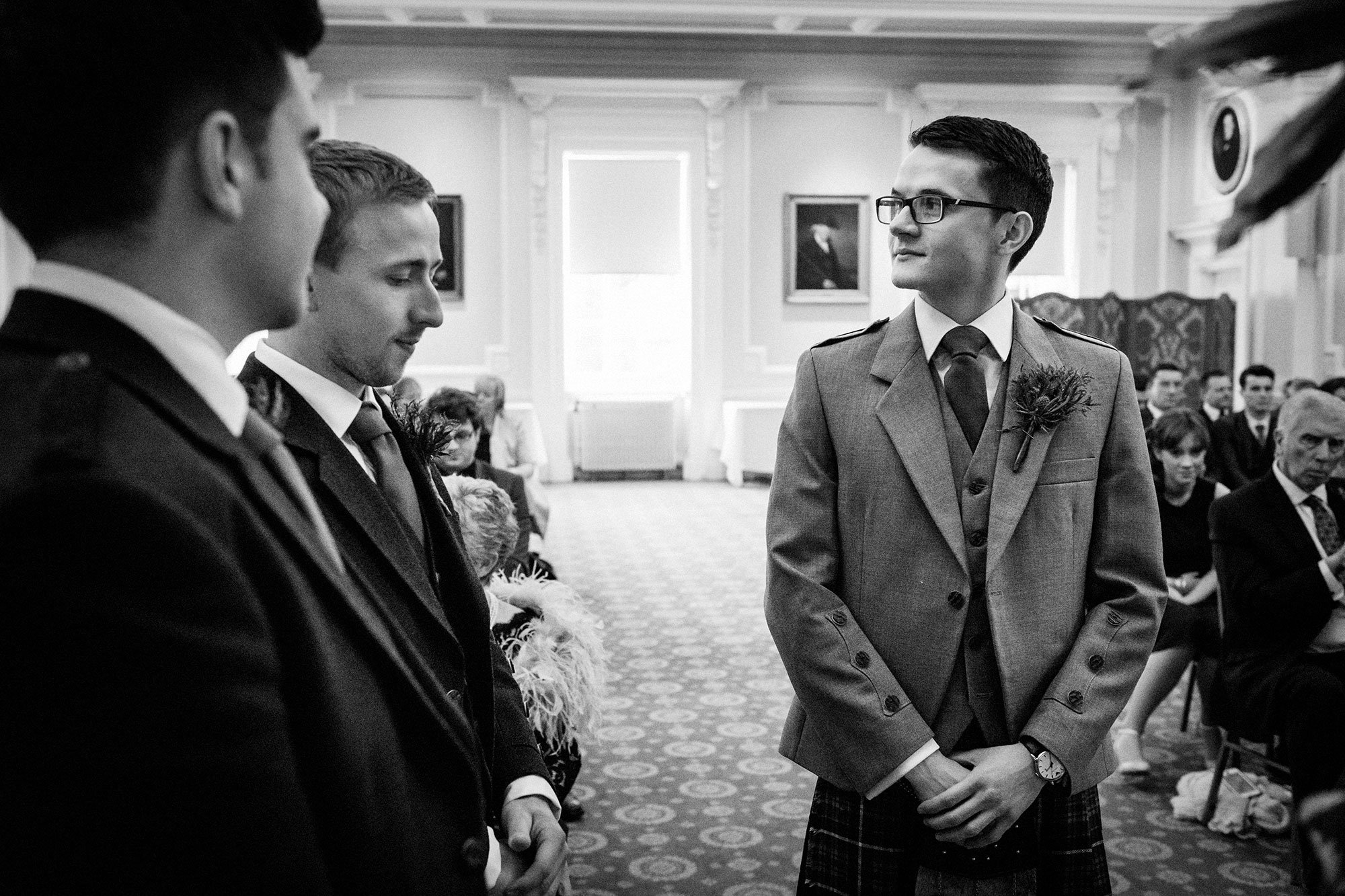 Groom waiting for bride at Surgeons Hall Edinburgh wedding