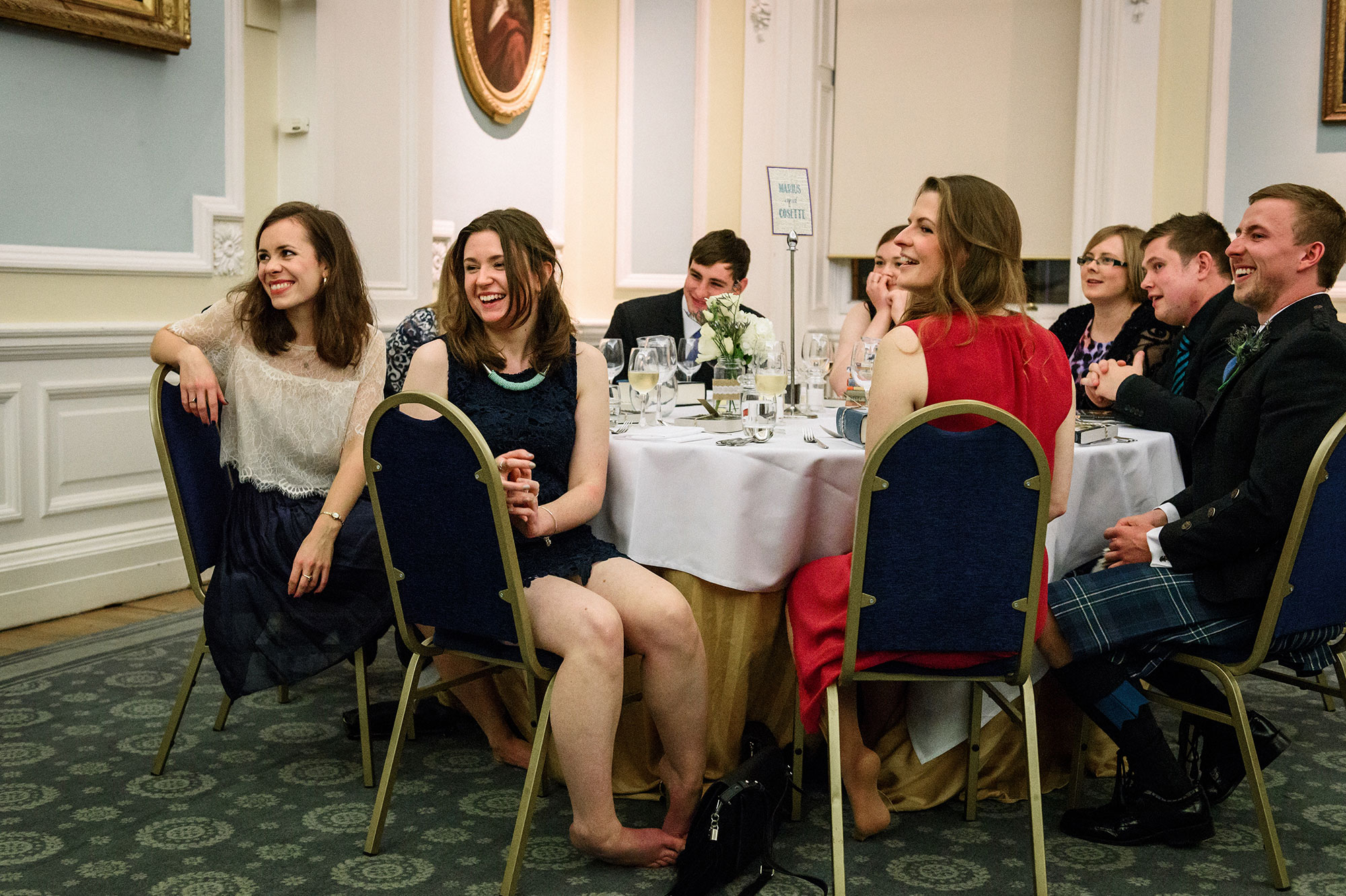 Guests during speeches at Surgeons Hall Edinburgh wedding